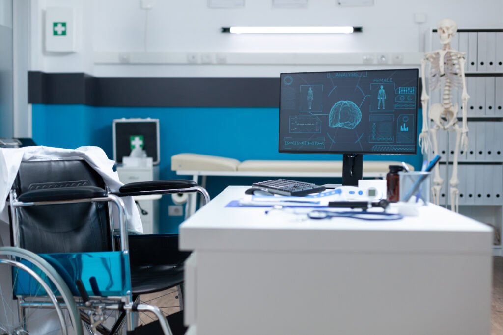 empty modern hospital office room equipped with medical professional equipment